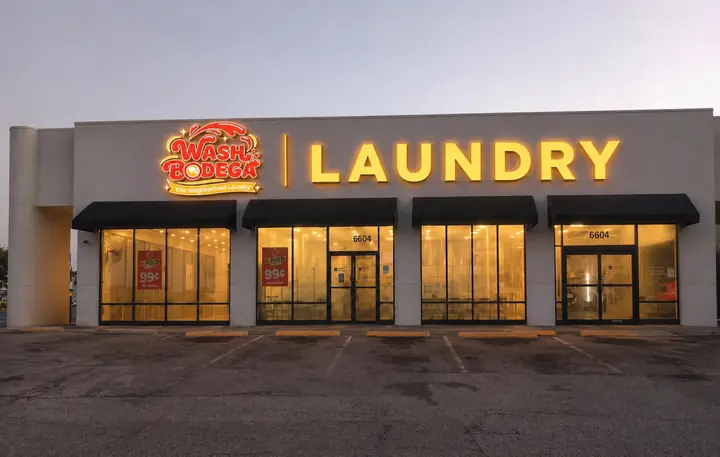 Temporary Wash Bodega storefront-style visual for W Bellfort location.